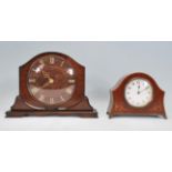 A 1920's Art Deco walnut cased Smiths eight day mantel clock having applied brass Roman numeral