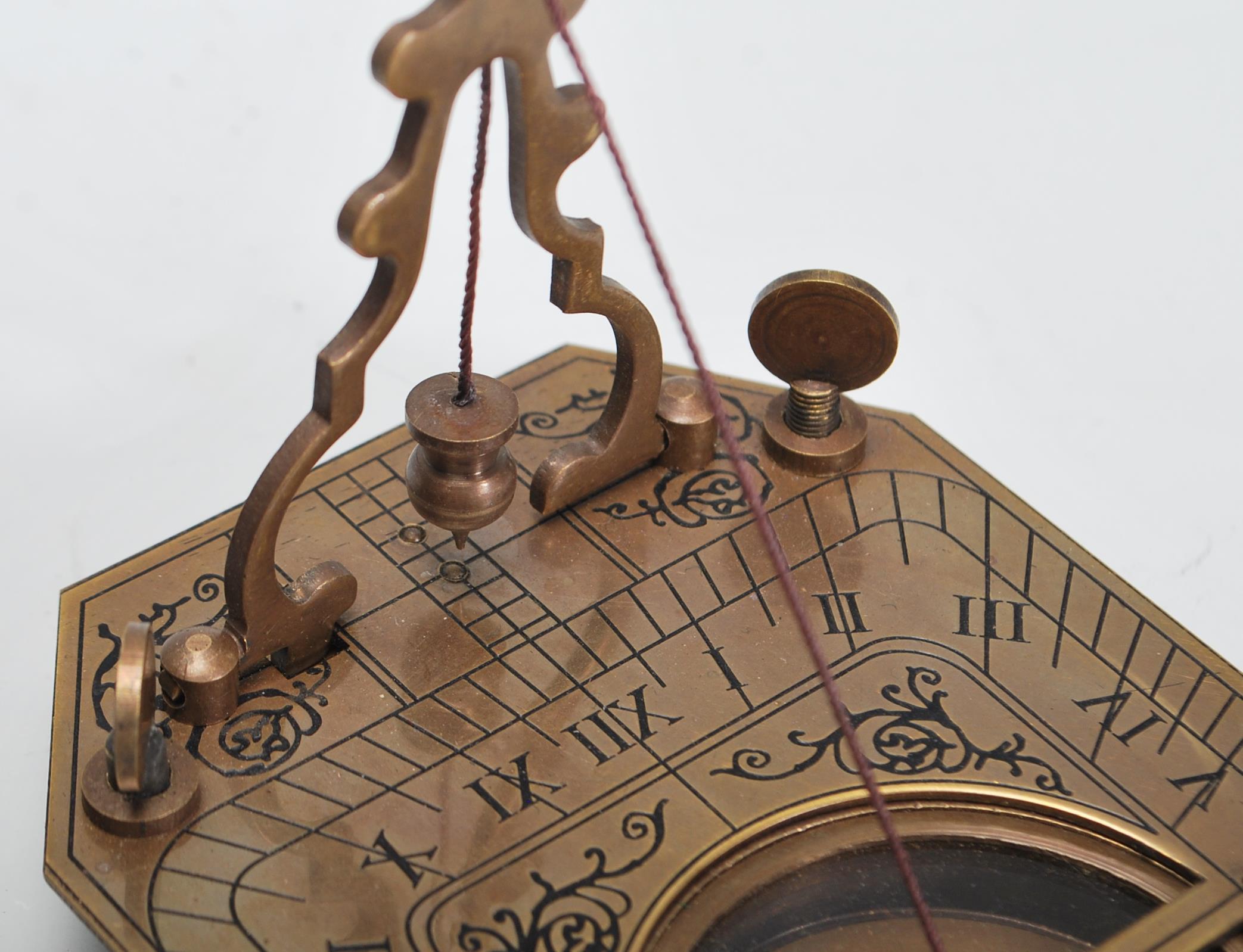 A 20th Century cased brass Sundial Compass, the compass set within the folding metamorphic - Image 4 of 9