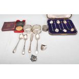 A collection of silver to include a cased set of silver hallmarked coffee bean spoons, Birmingham