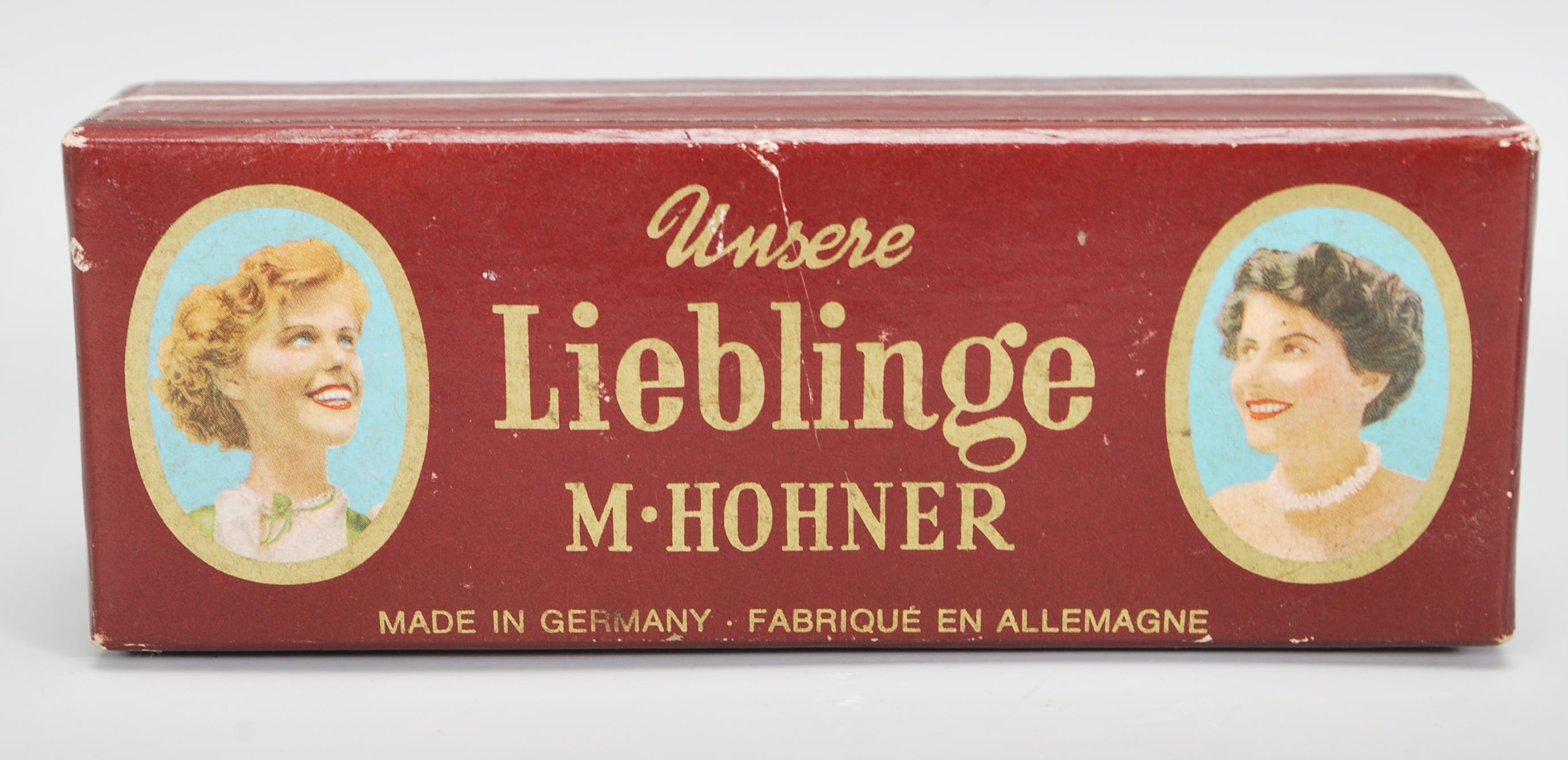 A vintage early 20th Century Unsere Lieblinge M. Hohner harmonica / mouth organ in original box. - Image 4 of 6