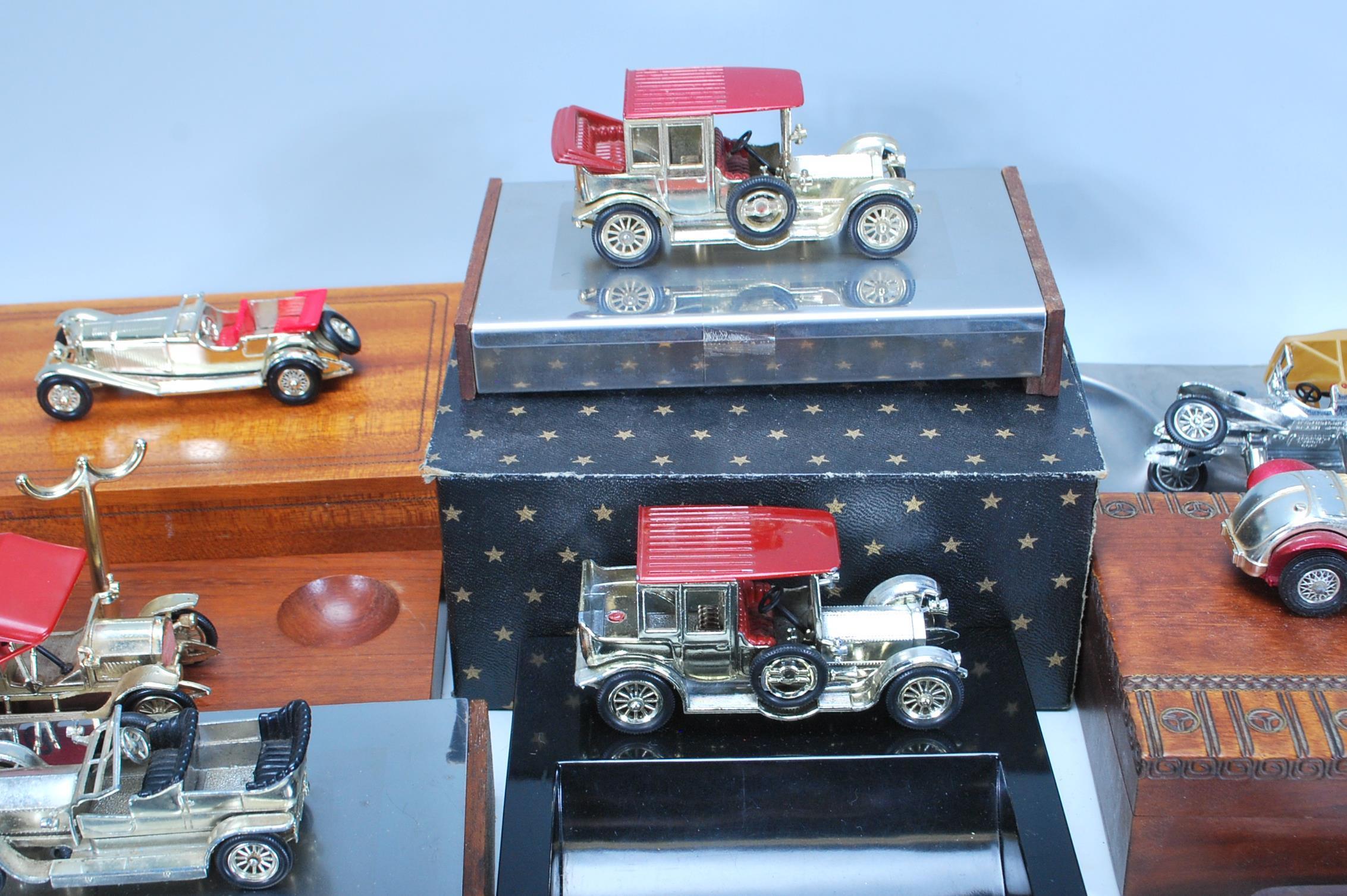 A large collection of Matchbox Vintage toy car topped ashtrays, trinket boxes, pen holders, pipe - Image 5 of 10
