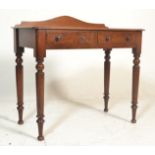 An 19th Century Victorian mahogany side table / writing table, gallery surround with fitted frieze