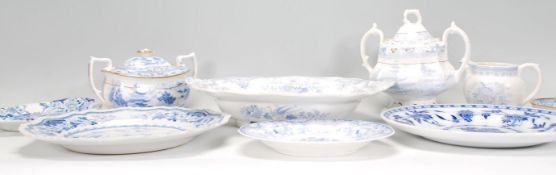 A collection of blue and white English ceramics dating from the 19th Century onwards to include