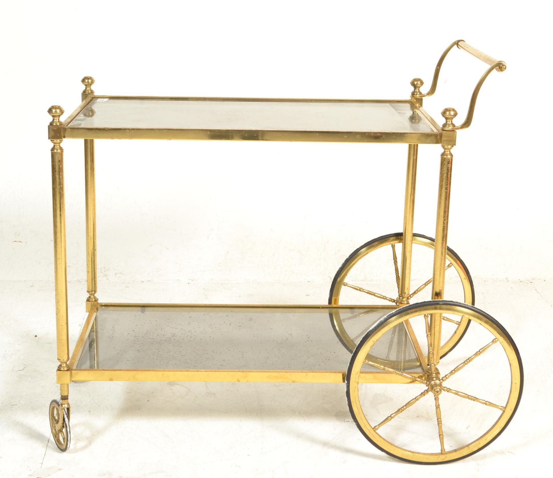 A mid century italian brass and smoked glass trolley table raised on original castors having twin - Bild 4 aus 5