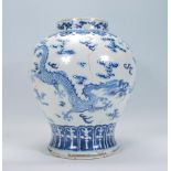 A late 18th / early 19th Century Chinese blue and white glazed bulbous baluster kangxi vase, the