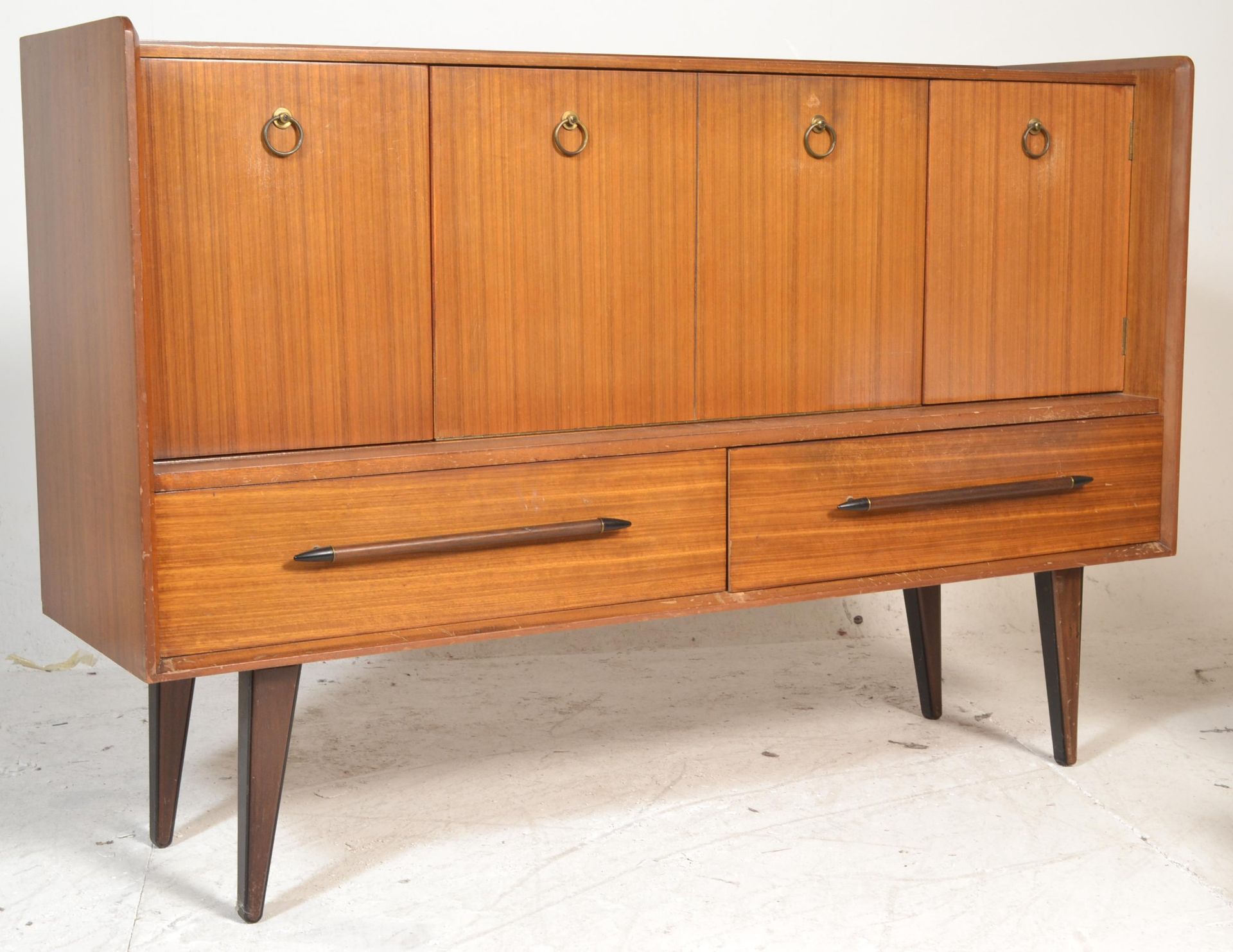 A vintage mid 20th Century Tola wood sideboard credenza, gallery back and sides with recessed