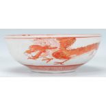 A 19th Century Japanese Kutani footed centrepiece bowl having hand painted decoration in red and