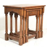 A good quality oak Jacobean revival nest of tables in the manner of Old Charm / Jaycee being