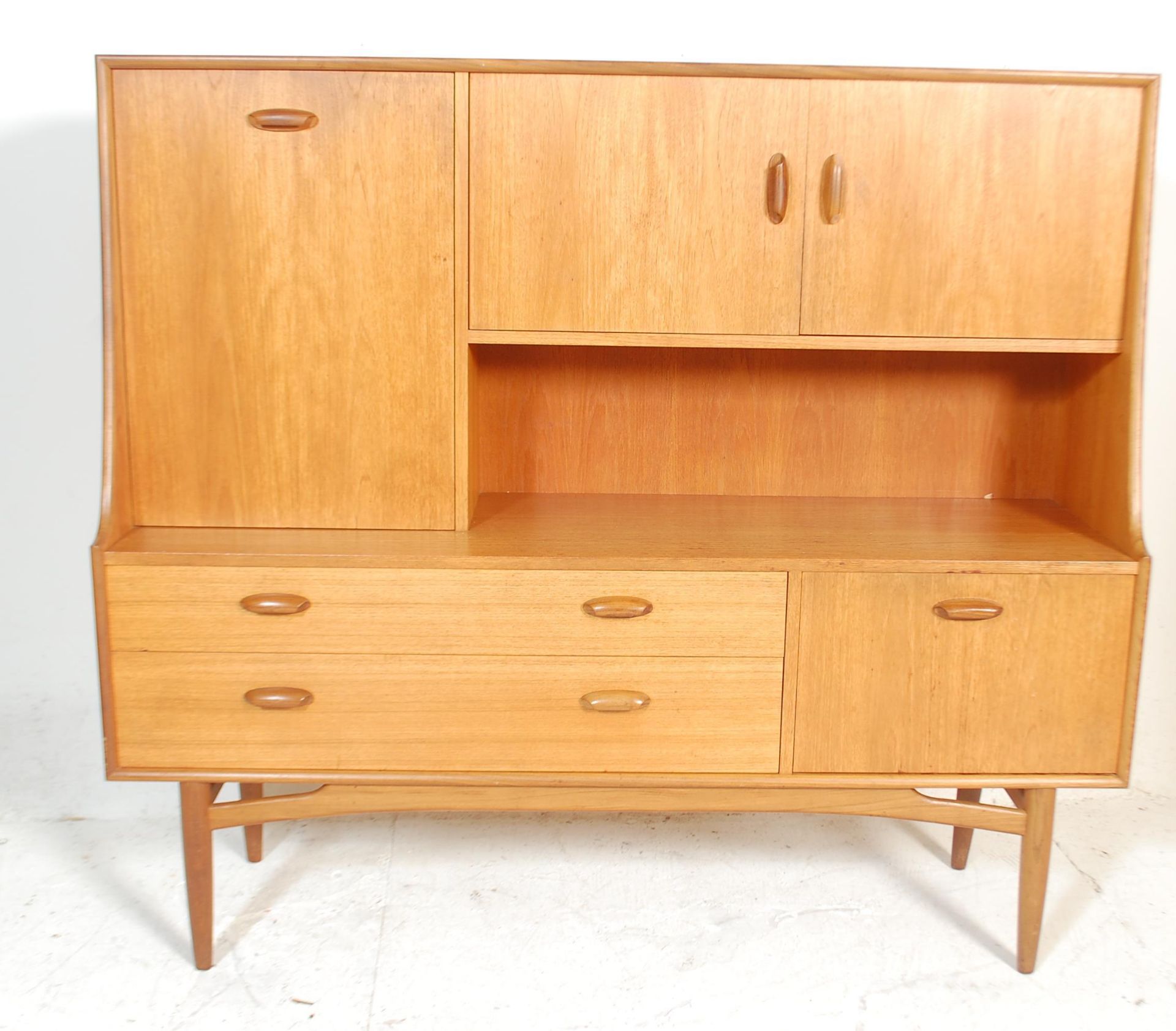 Brasilia - A retro 20th Century teak wood G-Plan highboard sideboard credenza, being raised on - Bild 2 aus 6