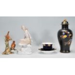 A collection of 20th Century ceramics to include a 1930's Carlton Ware lidded baluster vase having a