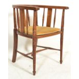 An early 20th Century Edwardian inlaid mahogany tub shaped splatback corner chair, upholstered seat,