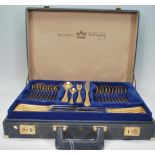 A 20th Century Bestecke Solingen canteen of gold plated cutlery for twelve complete in the canteen