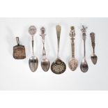 A selection of 20th Century silver spoons to include a a golfing related spoon with handle in the