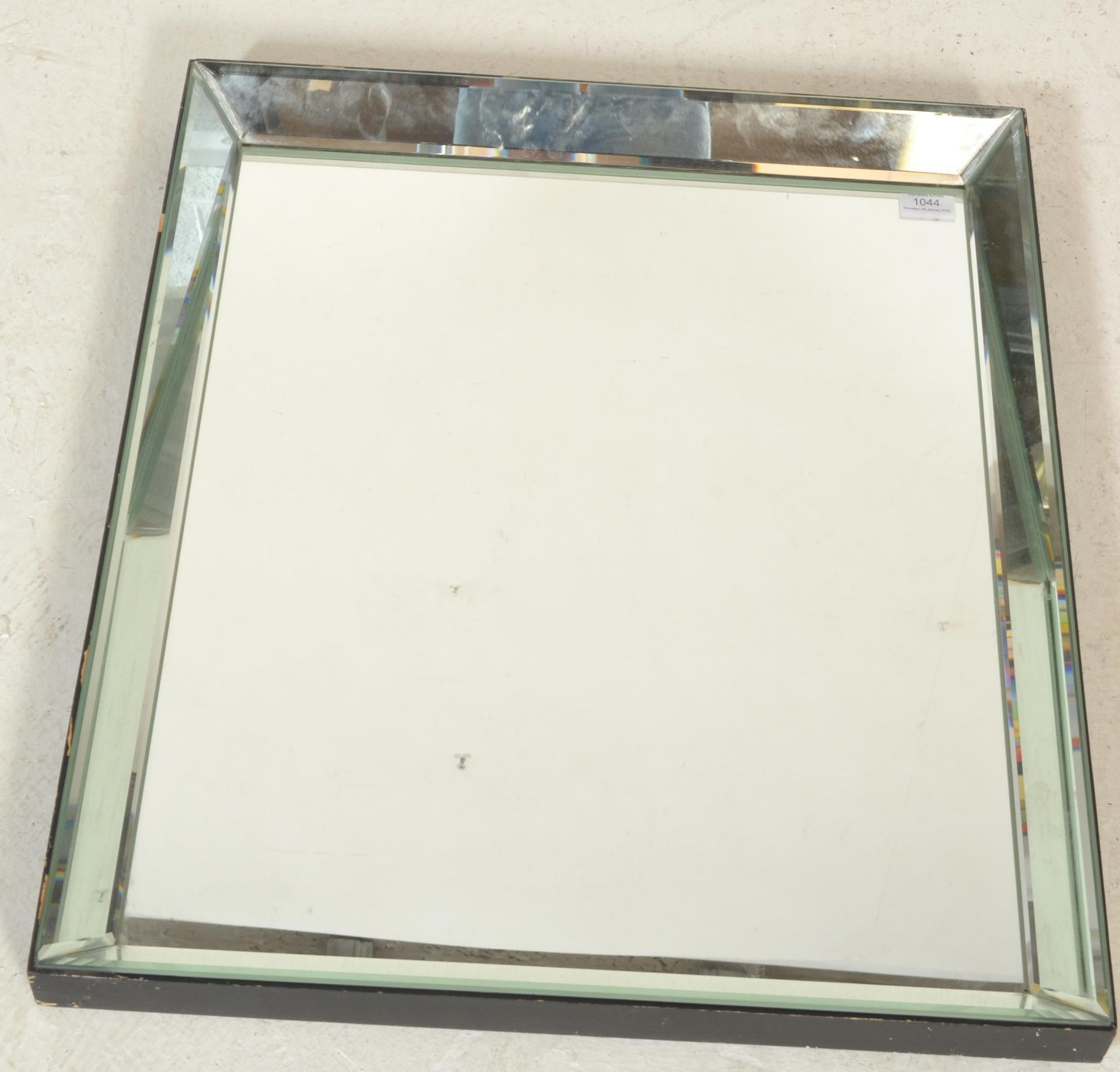 A 20th Century wall mirror of rectangular form having bevelled glass with an angular form mirror - Bild 2 aus 6