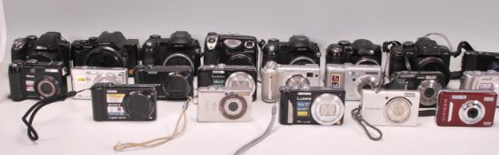 A large collection of modern cameras mainly digital format to include Panasonic, Lumix DMC-FZ10,