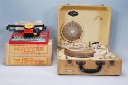A Vintage mid century childrens tin plate Mettype junior typewriter together with another Mettype
