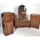 An early 20th Century Art Deco matching oak bedroom suite consisting of dressing table and