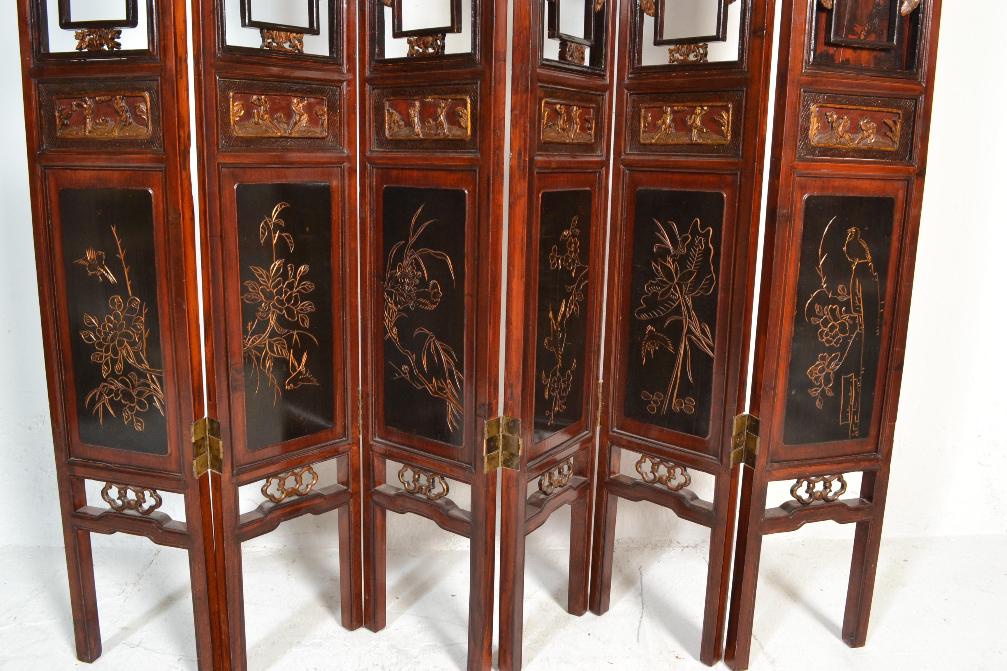 A large 20th Century six fold Chinese lacquered pine screen having scroll fret work panel atop - Image 3 of 4