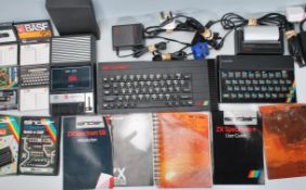 A vintage Sinclair ZX Spectrum games console together with a ZX Spectrum + 128k,  with user