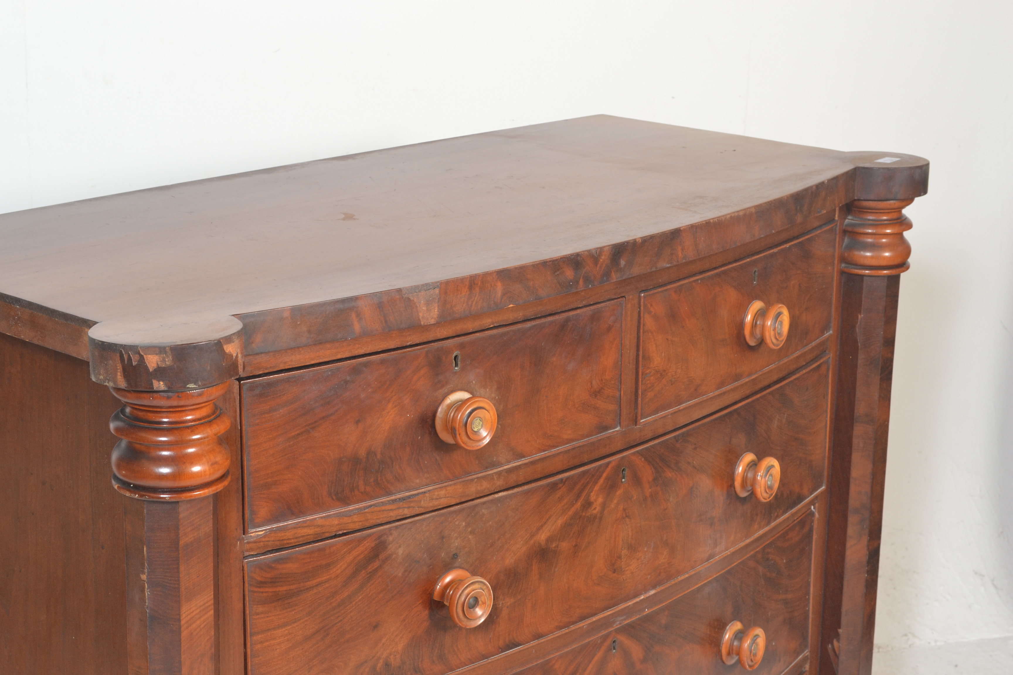 A 19th Century Victorian mahogany bow fronted two over three chest of drawers having turned knob - Image 3 of 5