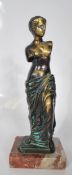 A 20th Century gilt bronze sculpture of Venus de Milo standing in typical classical pose having