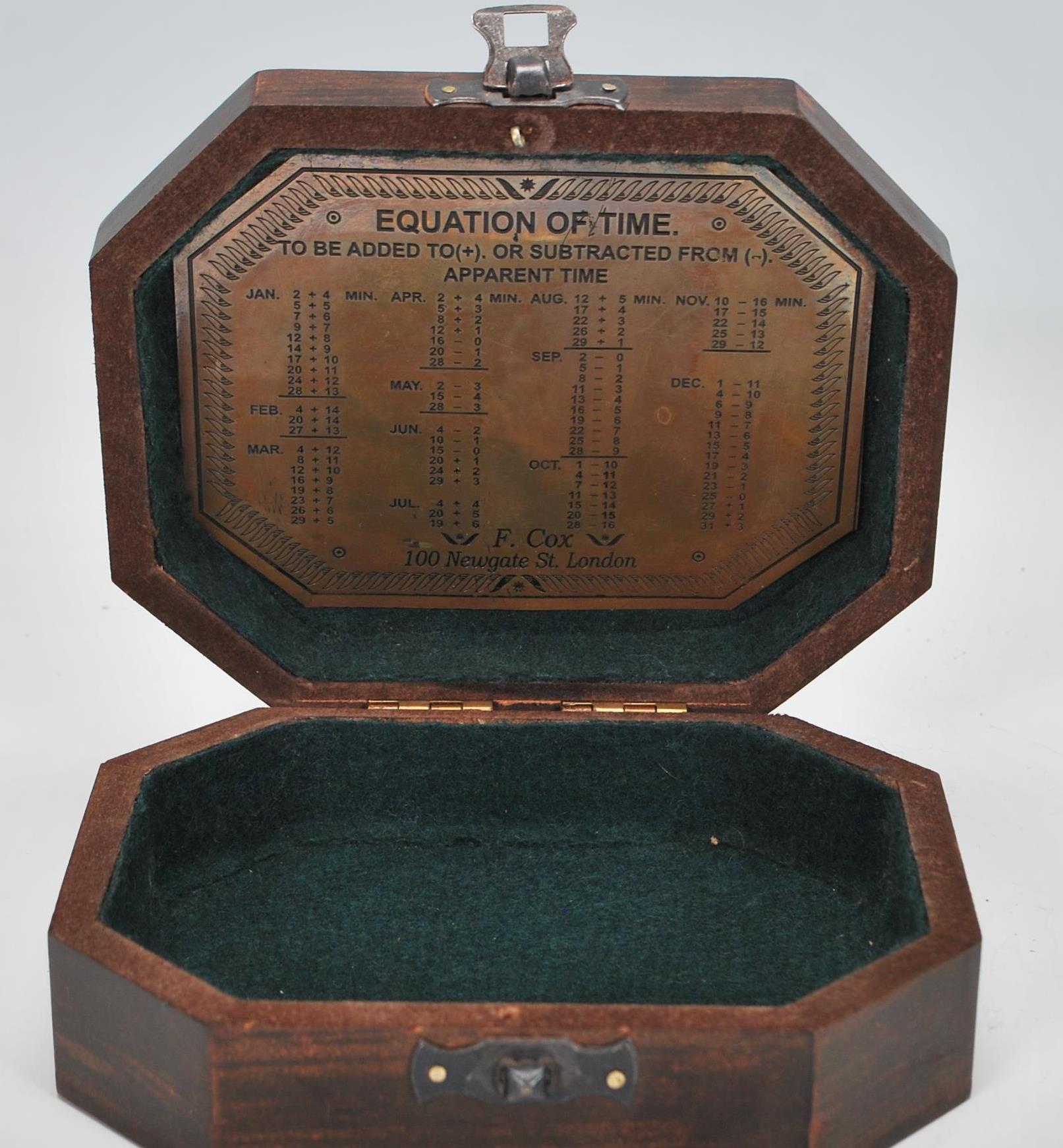A 20th Century cased brass Sundial Compass, the compass set within the folding metamorphic - Image 8 of 9