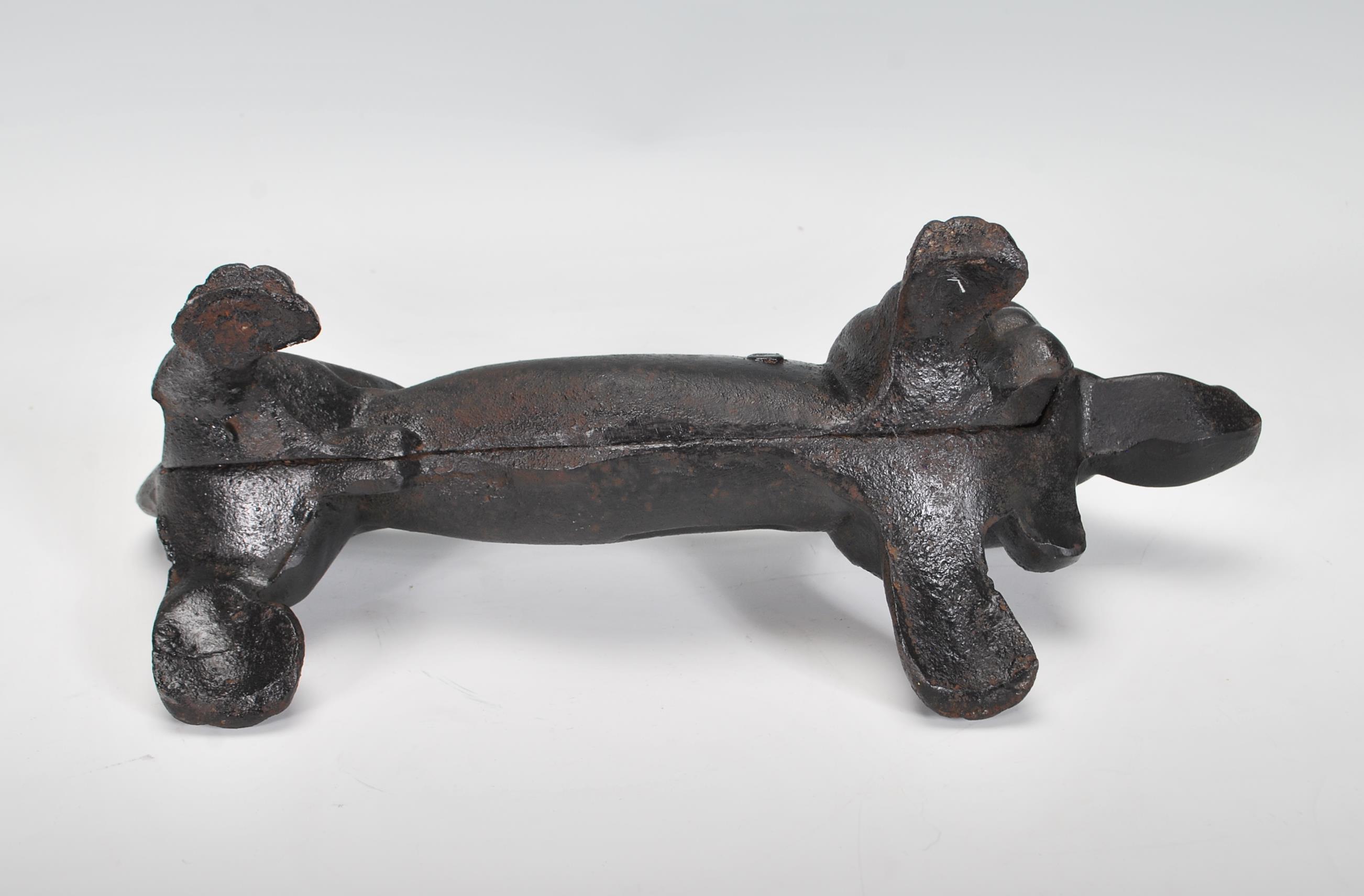 A 20th Century cast iron boot scraper scrape in the form of a Dachshund dog, finished in black paint - Image 7 of 7