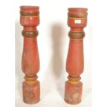 A pair of very large vintage 20th Century Indian  hardwood painted floor standing candlestick