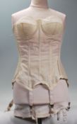 A mid 20th Century 1950's corset having ribbed con