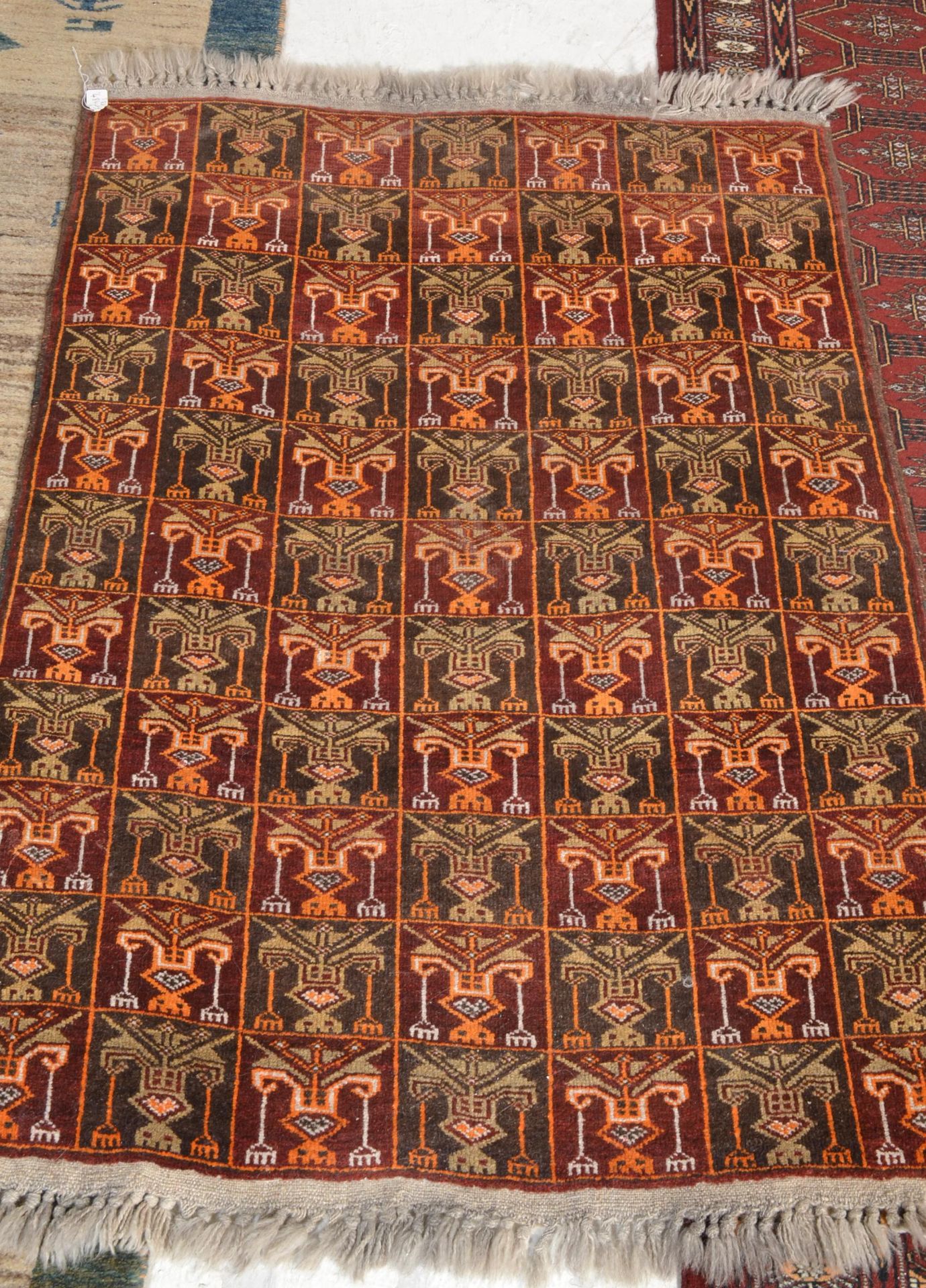 A collection of  20th century rugs to include a large red ground Persian runner with geometric - Image 3 of 7