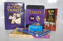 A group of three sets of Tarot cards to include a boxed 'The Mythic Tarot' by Juliet Sharman-Burke