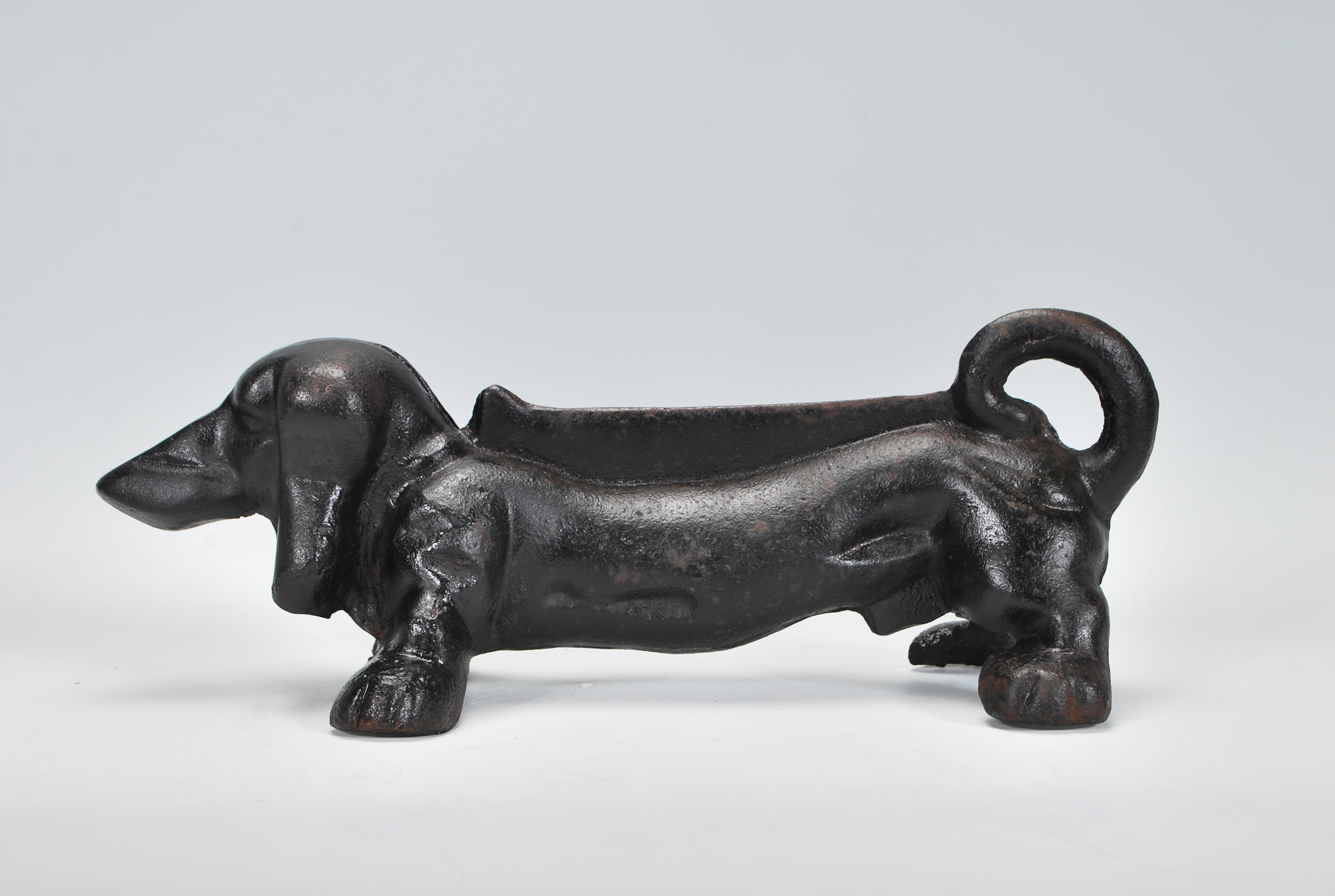 A 20th Century cast iron boot scraper scrape in the form of a Dachshund dog, finished in black paint - Image 2 of 7