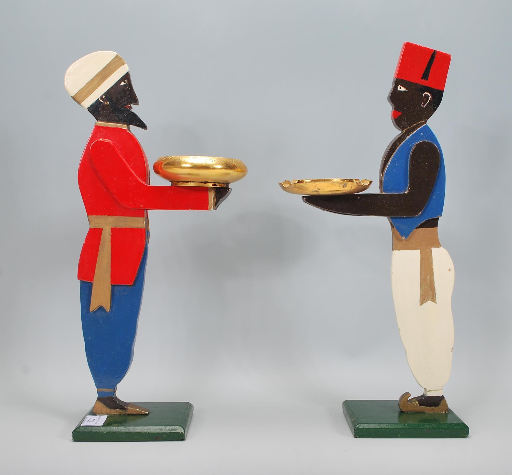 A pair of 20th Century free standing ashtrays modelled after dumbwaiters constructed from  wooden