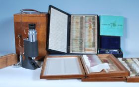 A vintage 20th Century MSE of London microscope within original fitted oak case with a small