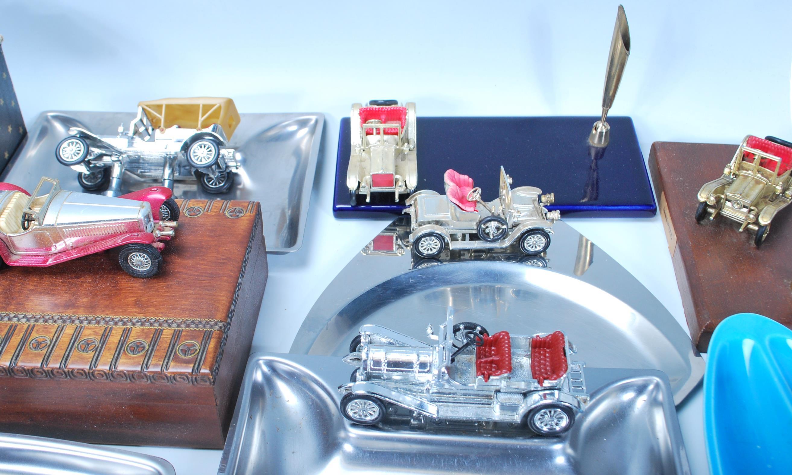 A large collection of Matchbox Vintage toy car topped ashtrays, trinket boxes, pen holders, pipe - Image 7 of 10
