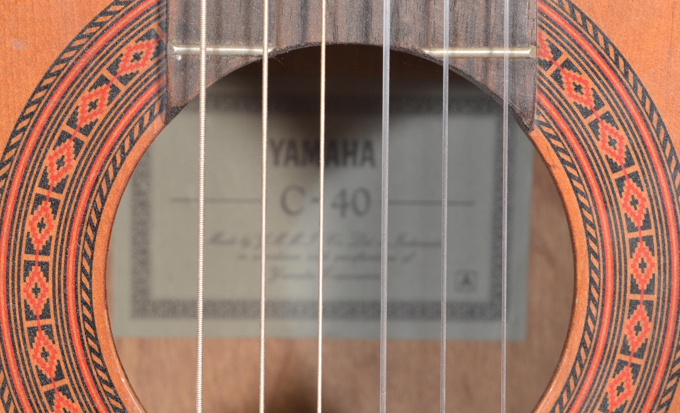 A 20th Century six string acoustic Yamaha C-40 Spanish style guitar, applied paper label to inside. - Image 6 of 6