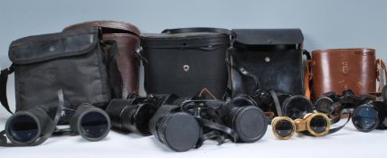A mixed group of binoculars dating from the early