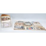 A collection of postcards dating from at the late 19th Century onwards, mostly from around the UK,