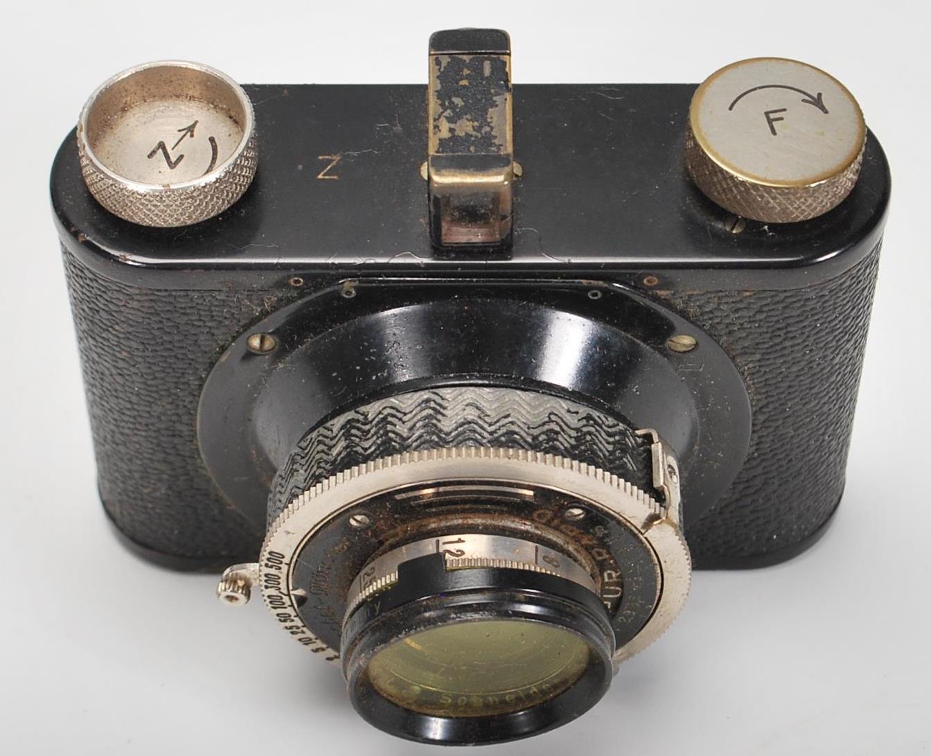 A vintage early 20th Century German Compur-Rapid F Deckel Munchen film camera in its original - Image 4 of 5