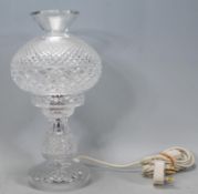 A 20th Century Waterford crystal cut glass crystal table lamp with removable shade, being hobnail