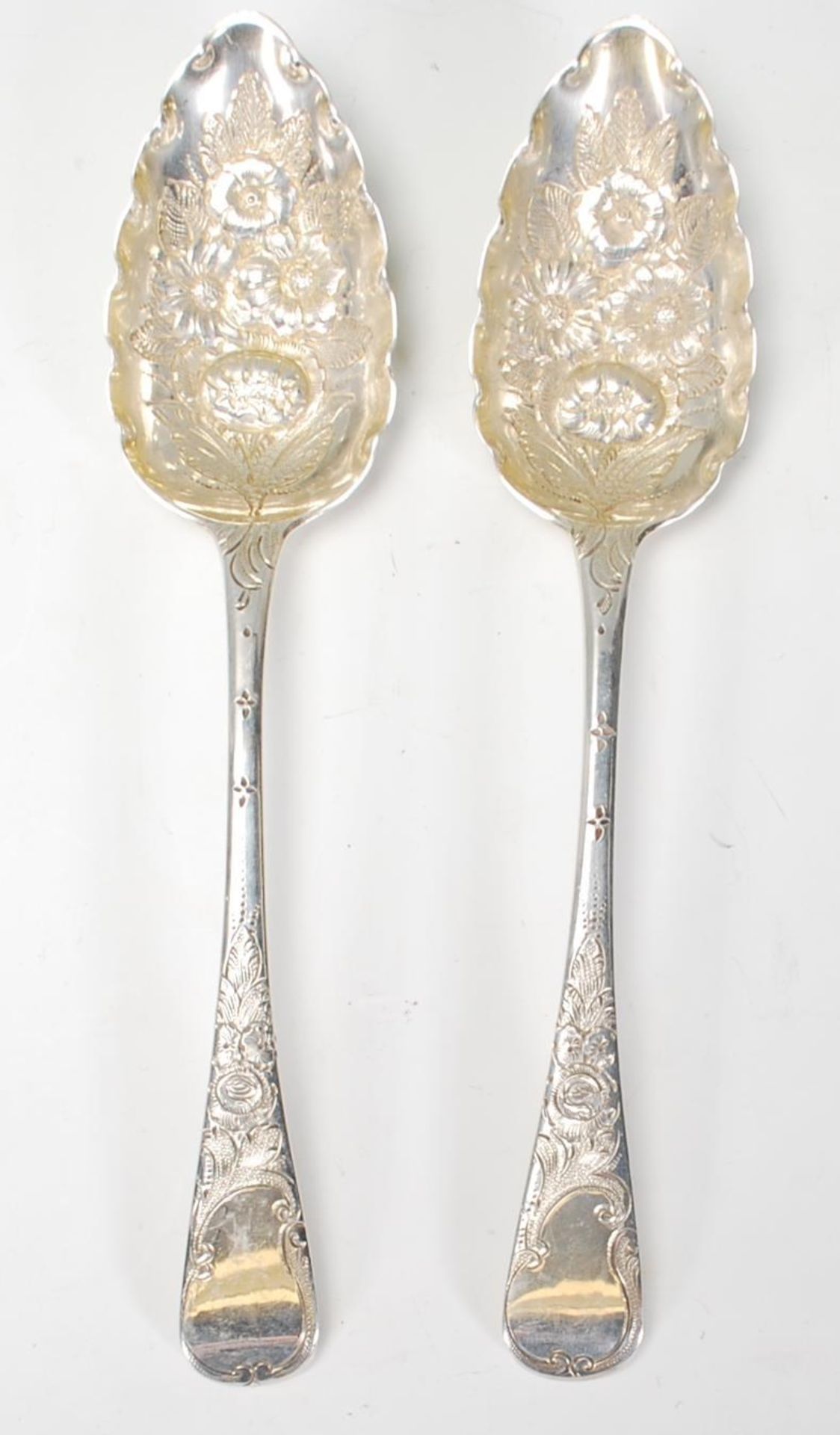 Two early 19th Century George III Sarah and John Blake silver hallmarked  berry spoons having
