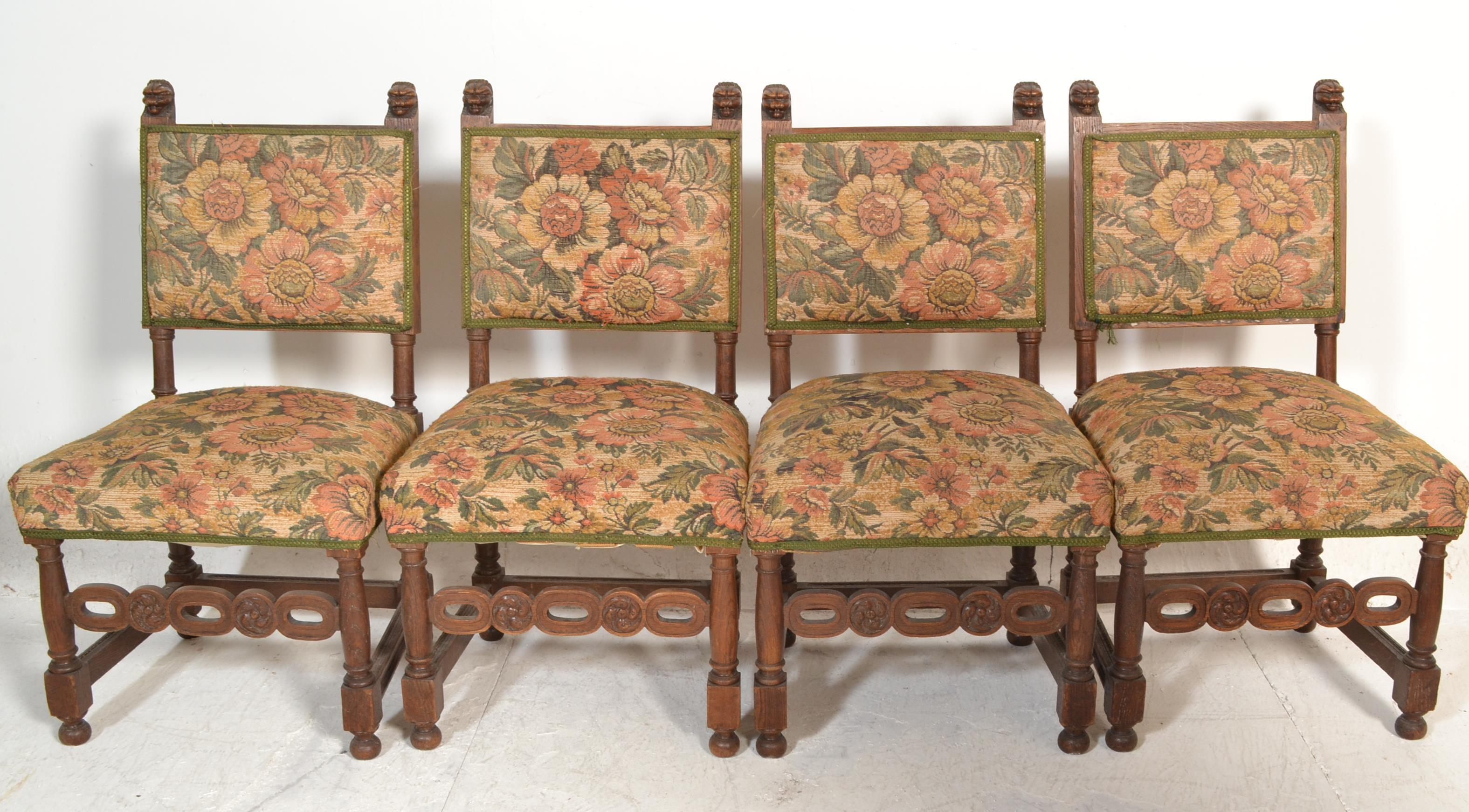 A set of 4 Victorian 19th century carved oak and tapestry upholstered dining chairs. Raised on