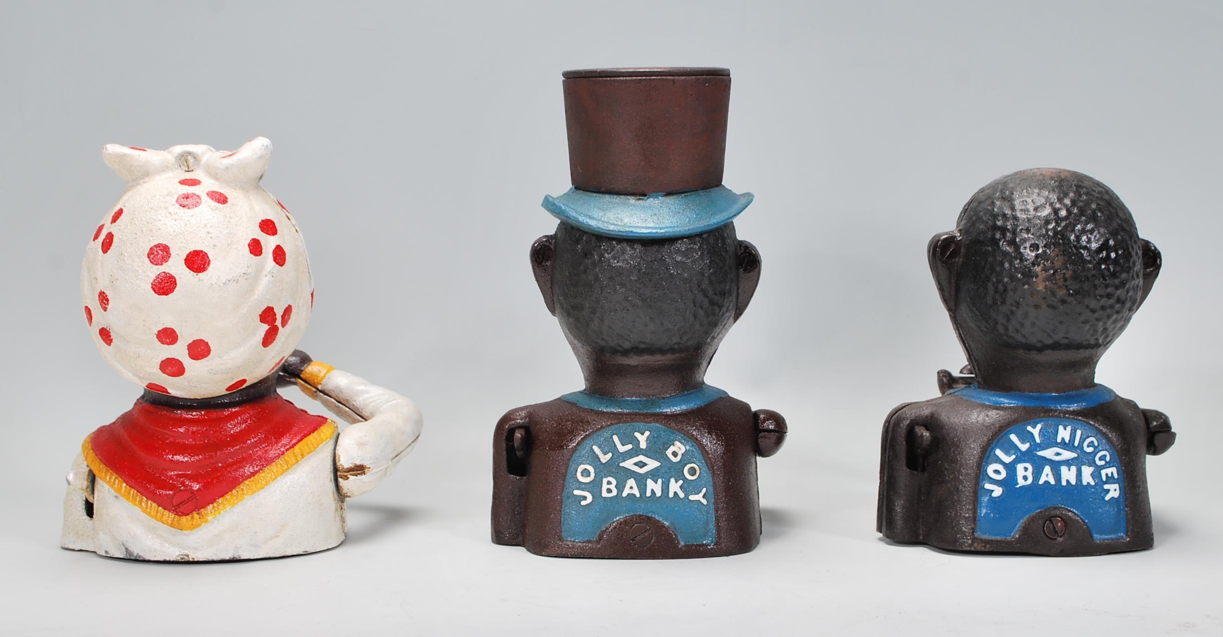 A group of three replica Little Joe style cast iron money banks to include two male figures and a - Image 3 of 6