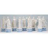 A full set of nine Wedgwood Jasperware figures modelled as The Classical Muses each raised on a