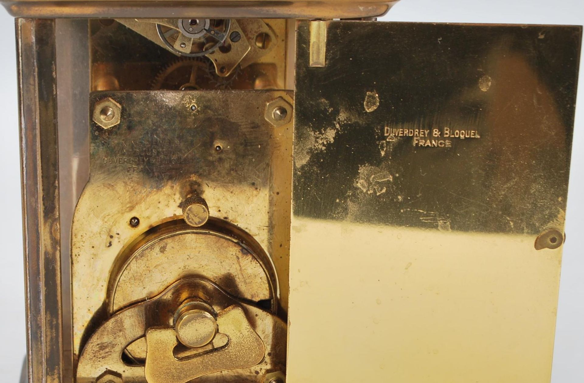 A 20th Century French Bayard 8 day carriage clock being brass cased with three sides set with glazed - Image 7 of 9