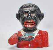 A believed original early 20th century cast iron negro money bank ‘ Little Joe Bank ‘ in the