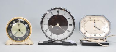 A group of three 20th Century Art deco mantel clocks by Smith Sectric and one Smith Electric. One of