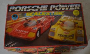 An original Scalextric boxed slot car racing set 'Porsche Power' appears complete within original