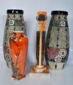 A mixed group of ceramic vases dating form the early 20th Century to include an Art Nouveau