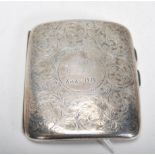 An early 20th Century William Aitken silver hallmarked cigarette case having scrolled foliate